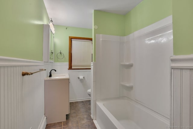 38 Craig Ave, Southington, CT 06489 - full bath with vanity, a wainscoted wall, toilet, tile patterned flooring, and bathing tub / shower combination
