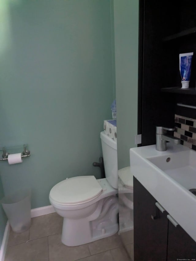 4 Lynn Ln, Windsor Locks, CT 06096 - bathroom featuring toilet, tile patterned floors, vanity, and baseboards