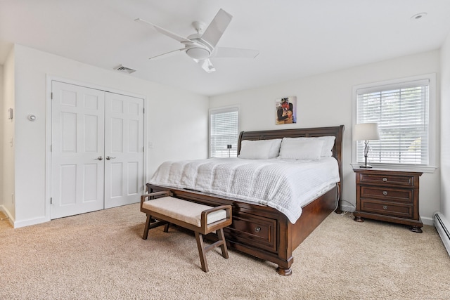 3657 Park Ave, Fairfield, CT 06825 - bedroom with light colored carpet, multiple windows, a closet, and a ceiling fan
