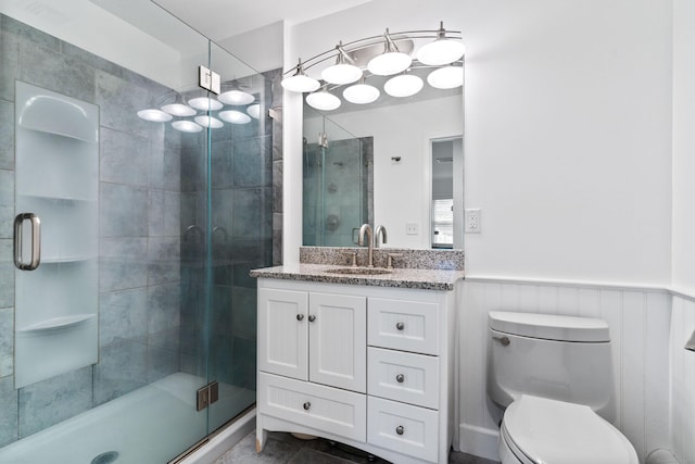3657 Park Ave, Fairfield, CT 06825 - bathroom with vanity, a stall shower, and wainscoting