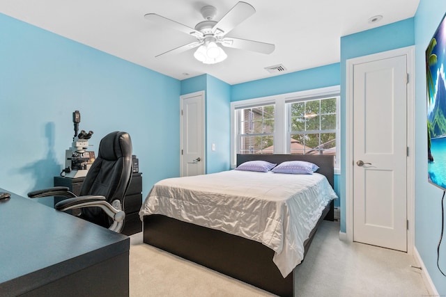 3657 Park Ave, Fairfield, CT 06825 - bedroom with light colored carpet, an office area, and a ceiling fan