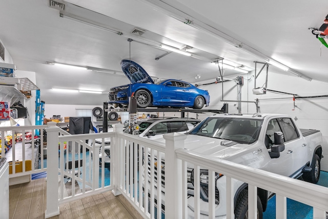 3657 Park Ave, Fairfield, CT 06825 - garage with a garage door opener