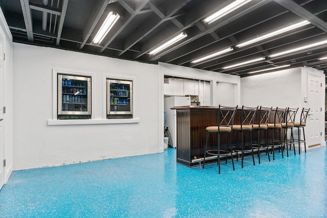 3657 Park Ave, Fairfield, CT 06825 - indoor dry bar with beverage cooler and speckled floor