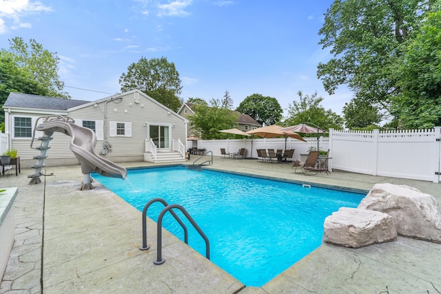 3657 Park Ave, Fairfield, CT 06825 - view of pool with a water slide, a patio area, and entry steps