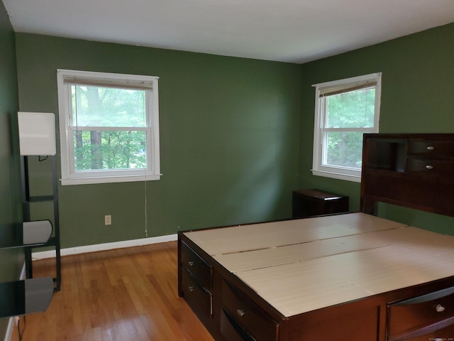 176 Hanover Rd, Newtown, CT 06470 - bedroom with light wood-type flooring and baseboards
