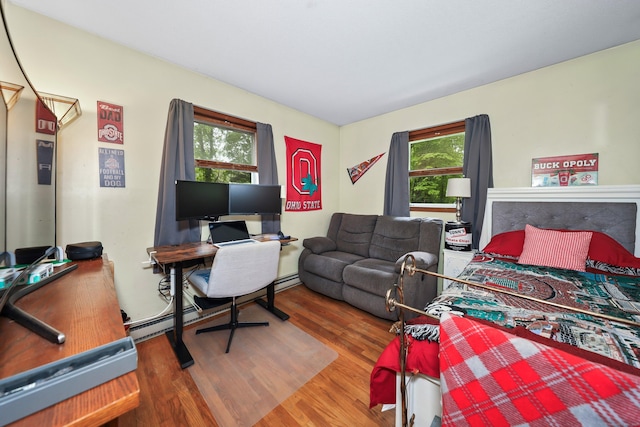 408 Reservoir Rd, Southbury, CT 06488 - bedroom with multiple windows and wood finished floors