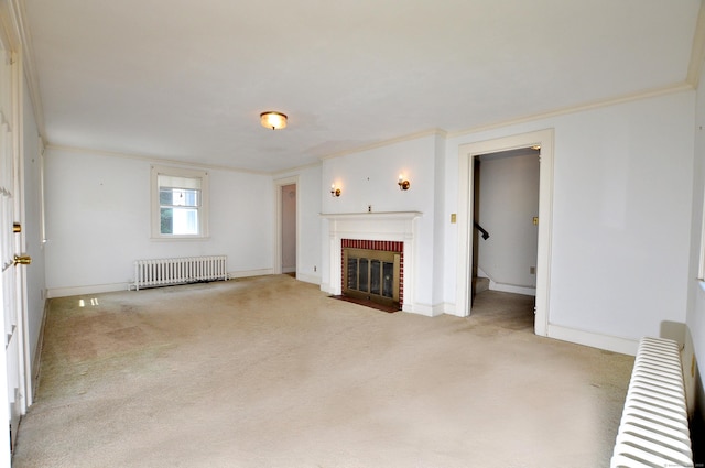 27 Prospect St, Bloomfield, CT 06002 - unfurnished living room featuring radiator heating unit, radiator, carpet flooring, ornamental molding, and a brick fireplace