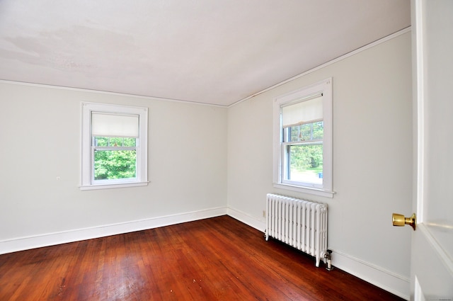 27 Prospect St, Bloomfield, CT 06002 - unfurnished room with radiator heating unit, healthy amount of natural light, baseboards, and crown molding