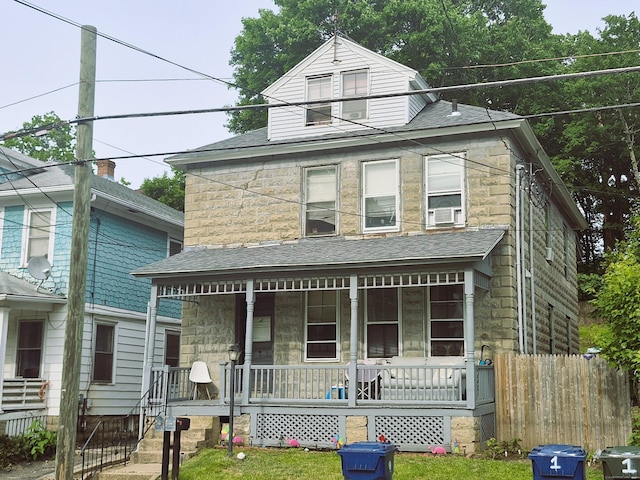 100 S St, Windham, CT 06226 - view of front facade with covered porch, stone siding, and a shingled roof