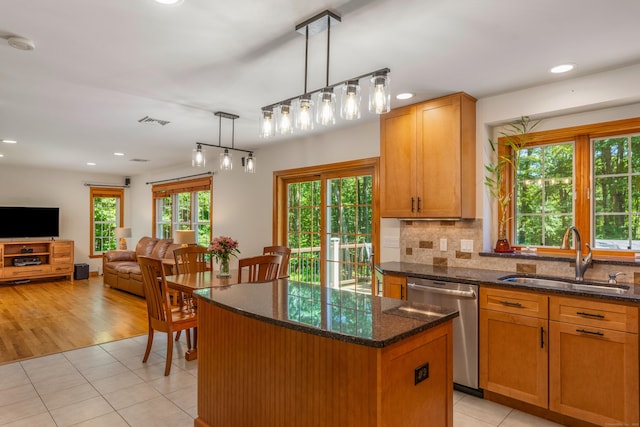 113 Charles St, Tolland, CT 06084 - kitchen with dishwasher, a sink, light tile patterned flooring, backsplash, and recessed lighting