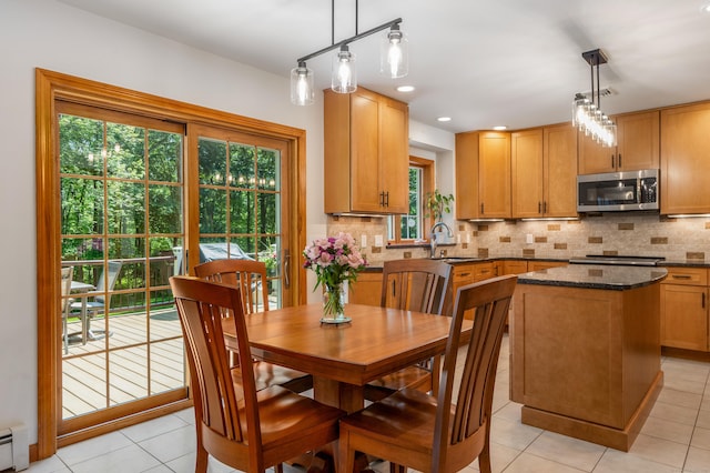 113 Charles St, Tolland, CT 06084 - dining area with light tile patterned floors, baseboard heating, and recessed lighting