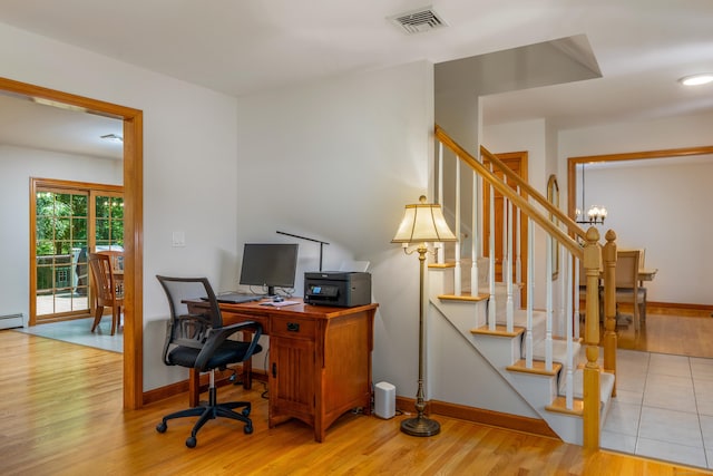 113 Charles St, Tolland, CT 06084 - office space featuring wood finished floors, a chandelier, and baseboards