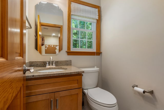 113 Charles St, Tolland, CT 06084 - bathroom with toilet and vanity