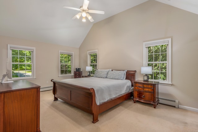 113 Charles St, Tolland, CT 06084 - bedroom with a baseboard heating unit, light carpet, baseboards, and high vaulted ceiling