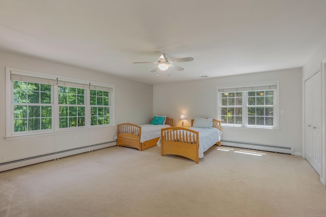 113 Charles St, Tolland, CT 06084 - bedroom featuring baseboard heating, multiple windows, and carpet