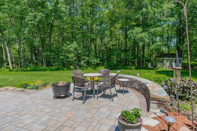 113 Charles St, Tolland, CT 06084 - view of patio / terrace featuring an outbuilding and outdoor dining area