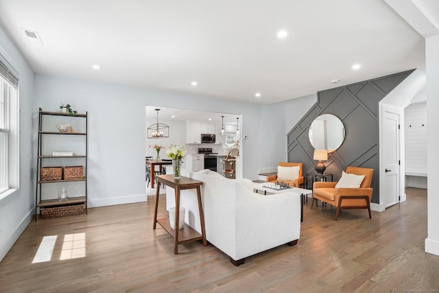 37 Highgate Rd, Trumbull, CT 06611 - living room with light wood-style flooring, baseboards, a chandelier, and recessed lighting