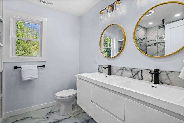 37 Highgate Rd, Trumbull, CT 06611 - full bath with marble finish flooring, double vanity, toilet, a marble finish shower, and baseboards