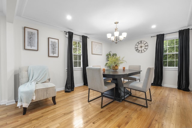 182 5th St, Stamford, CT 06905 - dining space with a chandelier, plenty of natural light, light wood-type flooring, crown molding, and recessed lighting