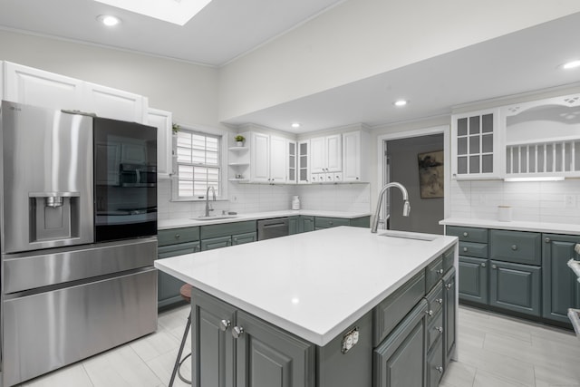 182 5th St, Stamford, CT 06905 - kitchen featuring appliances with stainless steel finishes, open shelves, a sink, white cabinets, and recessed lighting
