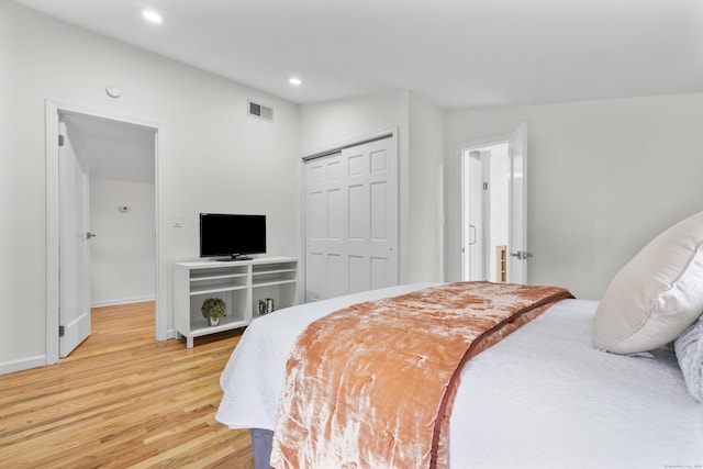 182 5th St, Stamford, CT 06905 - bedroom with light wood-style floors, a closet, recessed lighting, and baseboards