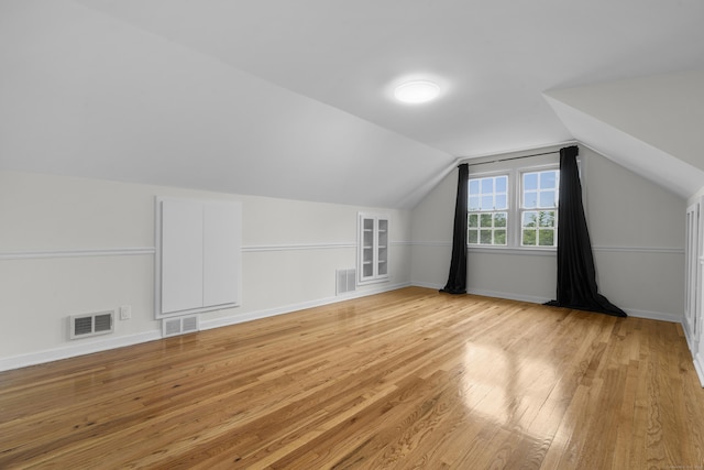 182 5th St, Stamford, CT 06905 - additional living space featuring light wood-style flooring, lofted ceiling, and baseboards