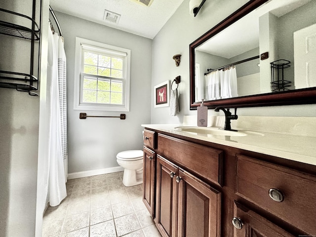 273 New London Rd, Colchester, CT 06415 - bathroom featuring vanity, toilet, baseboards, tile patterned floors, and curtained shower