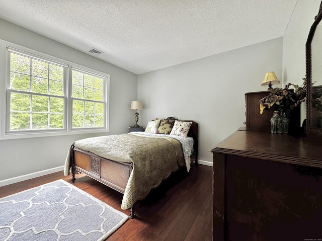 273 New London Rd, Colchester, CT 06415 - bedroom featuring wood finished floors, baseboards, and a textured ceiling