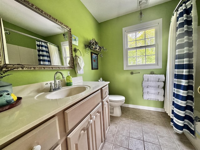 273 New London Rd, Colchester, CT 06415 - bathroom featuring vanity, toilet, tile patterned flooring, baseboards, and curtained shower