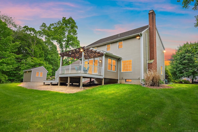 273 New London Rd, Colchester, CT 06415 - back of house with a pergola, a chimney, a lawn, and a wooden deck