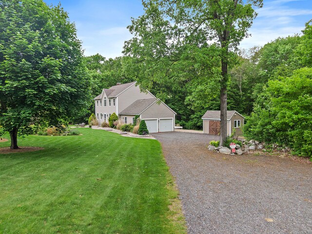 273 New London Rd, Colchester, CT 06415 - colonial house featuring a front lawn and driveway
