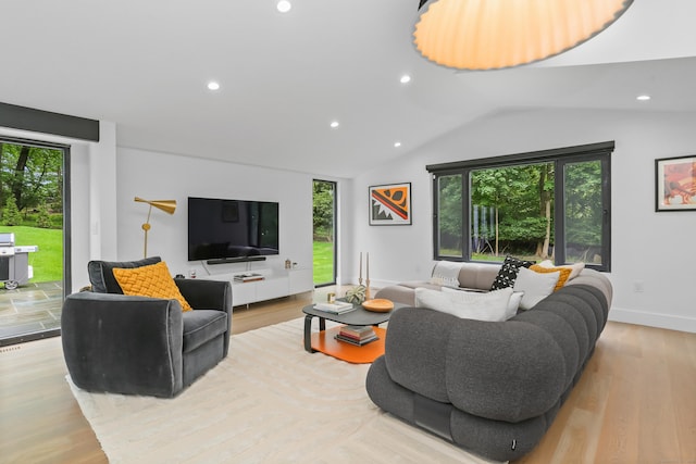 23 Wyndover Ln N, Stamford, CT 06902 - living room featuring healthy amount of natural light, recessed lighting, lofted ceiling, and wood finished floors