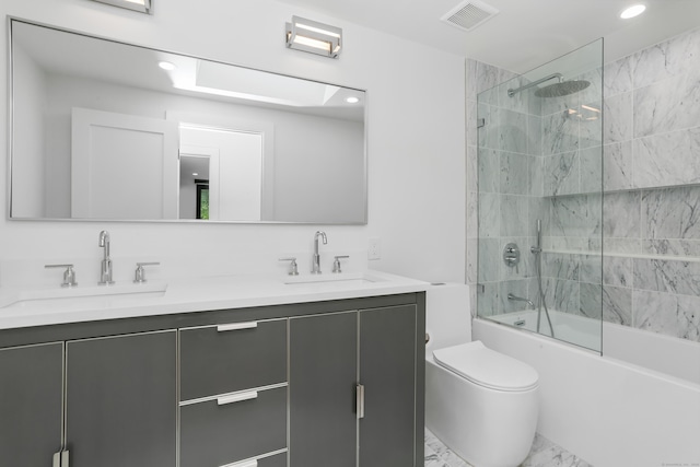23 Wyndover Ln N, Stamford, CT 06902 - full bathroom featuring toilet, double vanity, bathtub / shower combination, recessed lighting, and marble finish floors