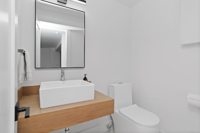 23 Wyndover Ln N, Stamford, CT 06902 - half bathroom featuring toilet and vanity