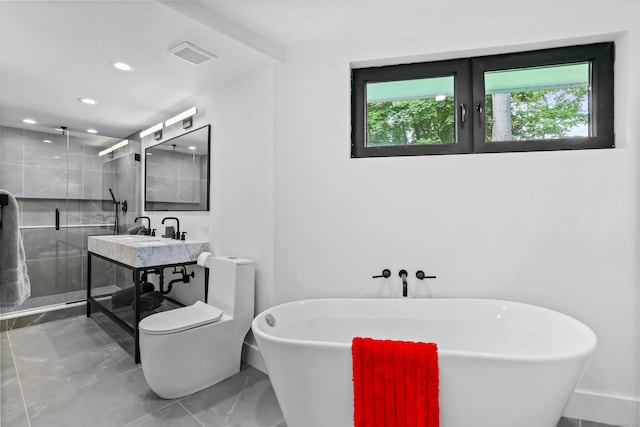 23 Wyndover Ln N, Stamford, CT 06902 - full bathroom featuring marble finish floors, a stall shower, a soaking tub, recessed lighting, and toilet