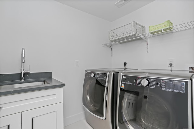 23 Wyndover Ln N, Stamford, CT 06902 - washroom featuring washing machine and clothes dryer and cabinet space