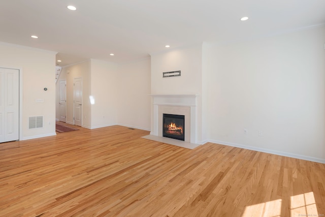 51 Lexington Gdns Unit 51, North Haven, CT 06473 - unfurnished living room featuring crown molding, recessed lighting, a fireplace with flush hearth, light wood-style floors, and baseboards