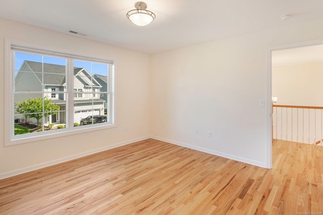 51 Lexington Gdns Unit 51, North Haven, CT 06473 - empty room featuring light wood-style floors and baseboards