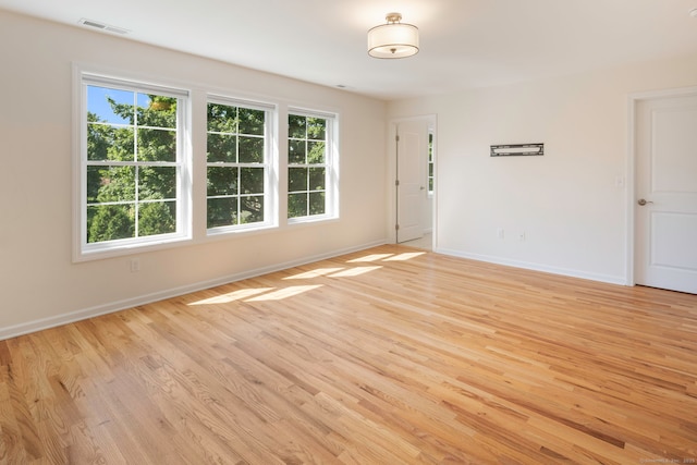 51 Lexington Gdns Unit 51, North Haven, CT 06473 - unfurnished room with light wood-type flooring and baseboards