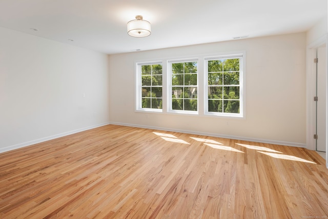 51 Lexington Gdns Unit 51, North Haven, CT 06473 - spare room featuring light wood-type flooring and baseboards