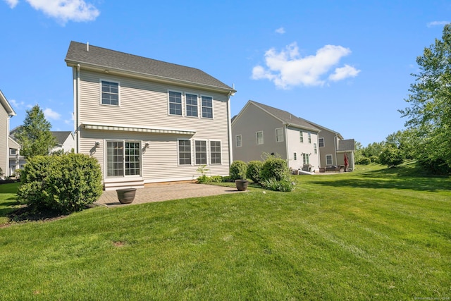 51 Lexington Gdns Unit 51, North Haven, CT 06473 - back of house with a patio area and a lawn