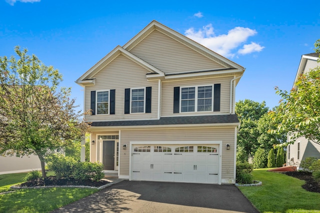51 Lexington Gdns Unit 51, North Haven, CT 06473 - view of front facade with driveway, a front yard, and a garage