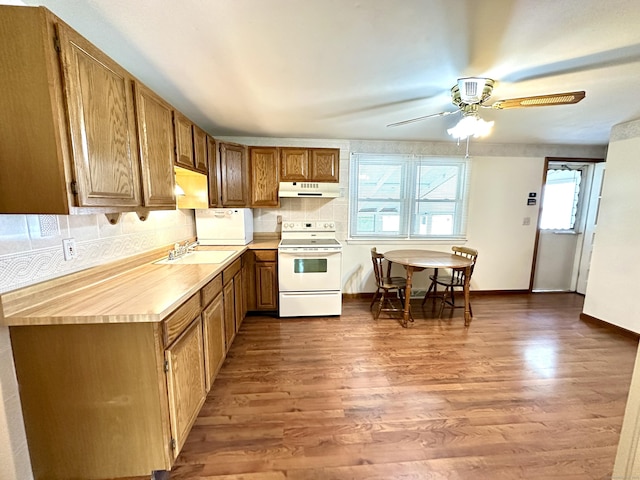 107 Montemerlo Ave, Windsor Locks, CT 06096 - kitchen featuring electric range, wood finished floors, light countertops, and under cabinet range hood