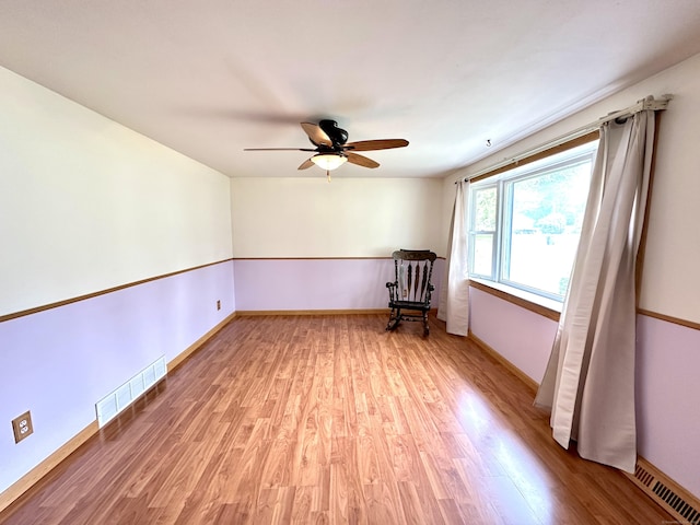 107 Montemerlo Ave, Windsor Locks, CT 06096 - unfurnished room with wood finished floors, ceiling fan, and baseboards