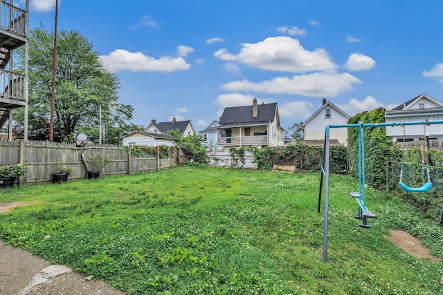 67 Ash St, Bridgeport, CT 06605 - fenced backyard with a playground