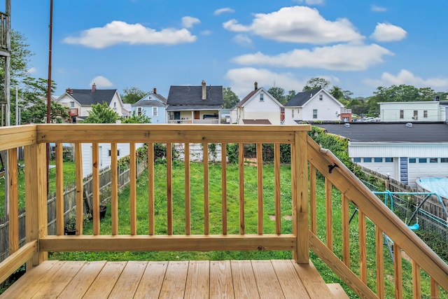 67 Ash St, Bridgeport, CT 06605 - deck featuring a residential view and a yard