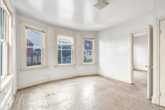 67 Ash St, Bridgeport, CT 06605 - unfurnished room featuring tile patterned floors and baseboards