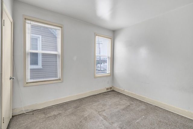67 Ash St, Bridgeport, CT 06605 - unfurnished room with carpet flooring and baseboards