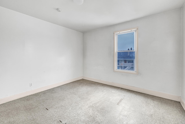 67 Ash St, Bridgeport, CT 06605 - carpeted spare room featuring baseboards