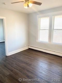 67 Ash St, Bridgeport, CT 06605 - unfurnished room with a baseboard heating unit, a ceiling fan, and dark wood-type flooring